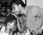 Daddy praying for one of his apprentice the 1970s